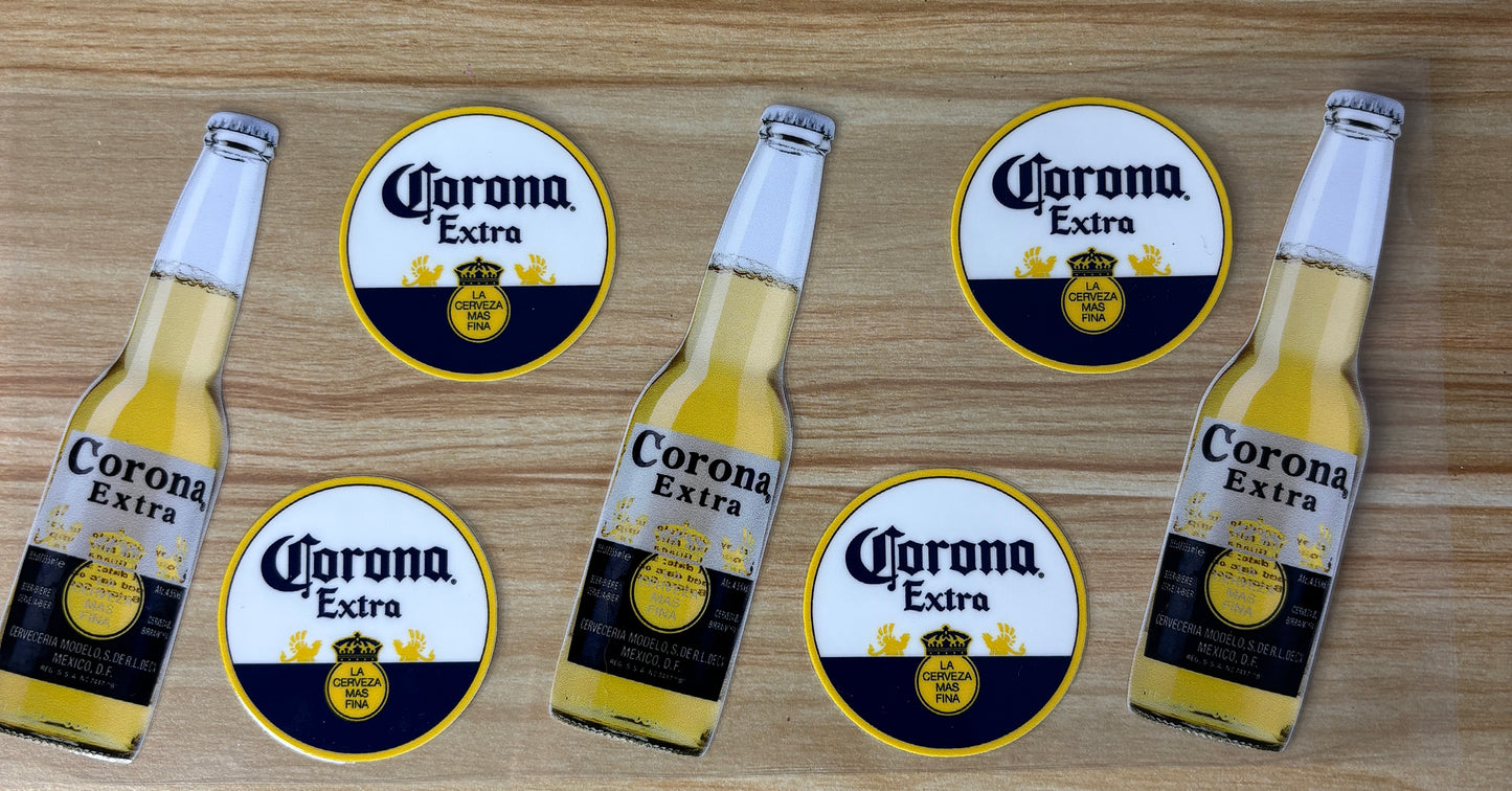 six bottles of Corona Extra beer arranged on a wooden surface.