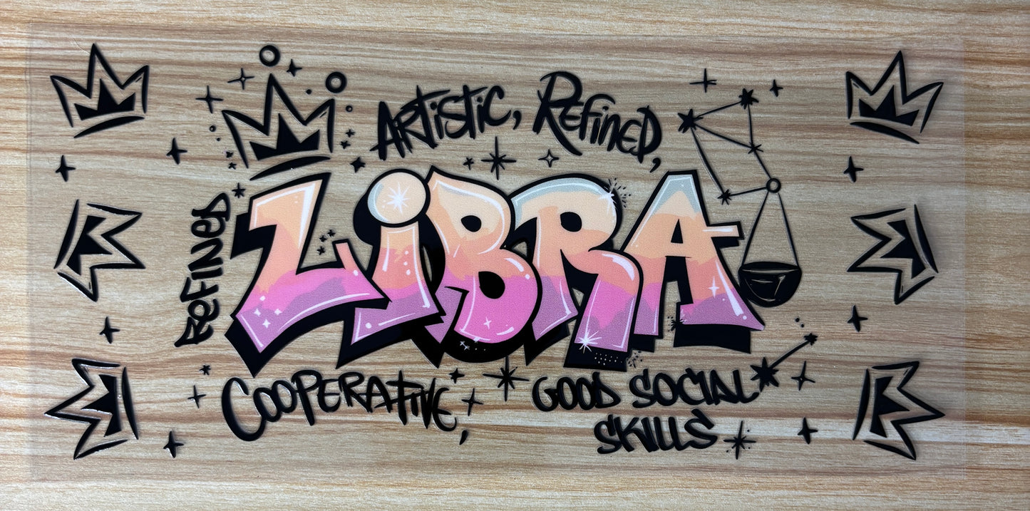 a colorful graffiti-style text that reads "LIBRA" surrounded by various decorative elements such as crowns, stars, and other abstract shapes.