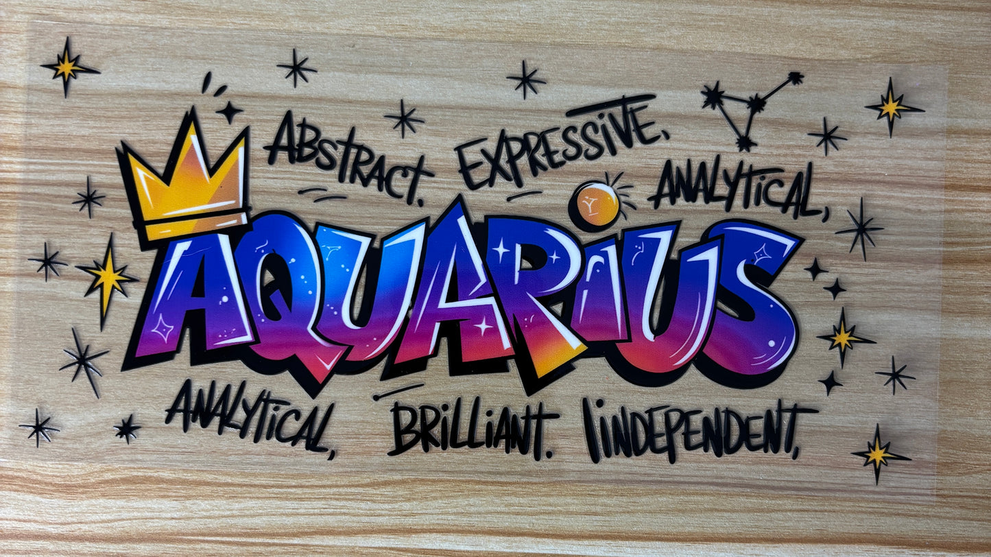 a vibrant and colorful graffiti-style text that reads "Aquarius" with various descriptions around it, such as " Abstract," "Expressive," "Analytical," "Brilliant," and "Independent."