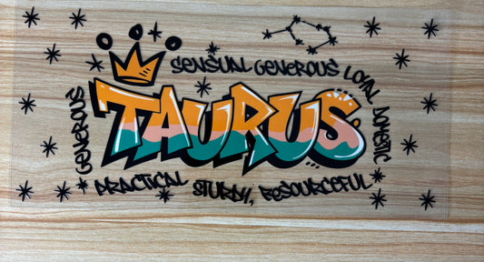 a colorful graffiti-style design with the word "Taurus" prominently displayed. Surrounding the word "Taurus" are various words and phrases such as "sensitive generous loving", "practical study", "resOURCEFUL", and "domicious". The overall design has a playful and artistic feel, with the use of stars and the word "Taurus" creating a visually striking composition.