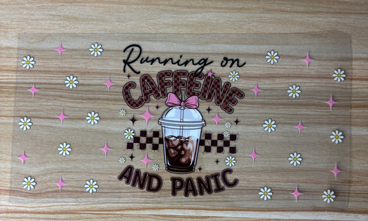 a clear cup with a straw, surrounded by pink and white flowers, and the text "Running on Caffeine and Panic" written above it.
